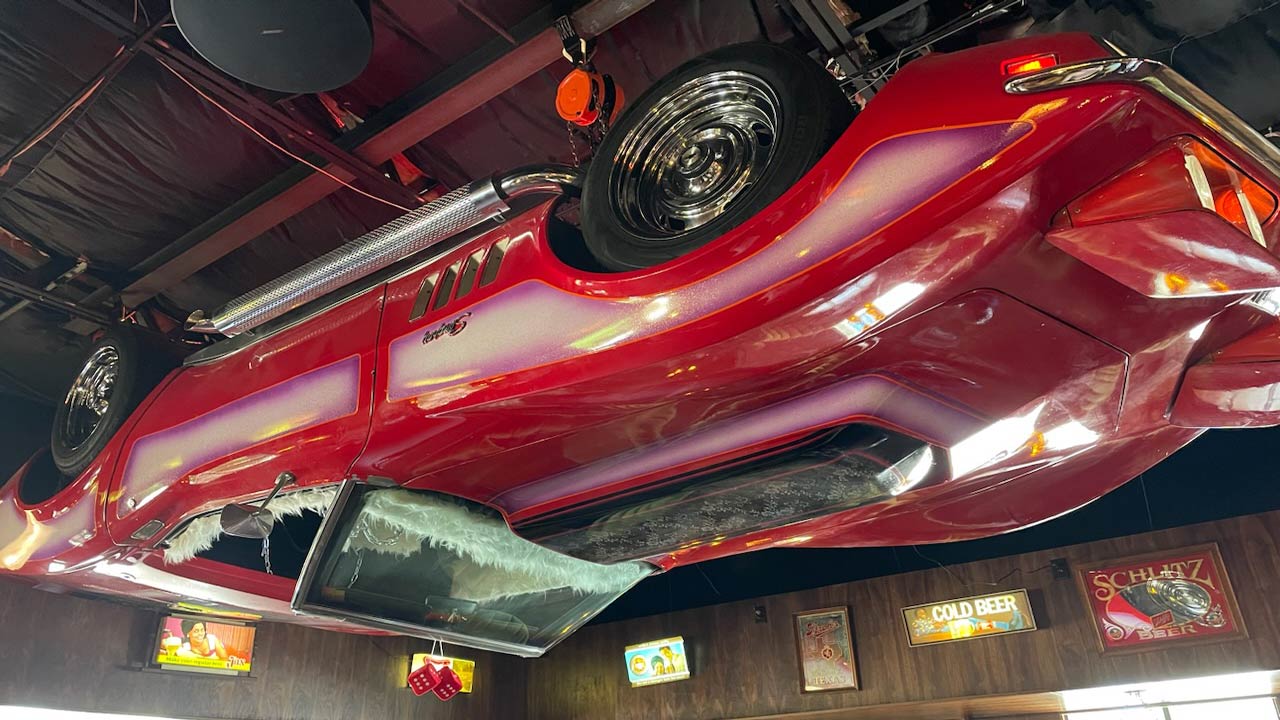 corvette hanging upside down at Busty's.