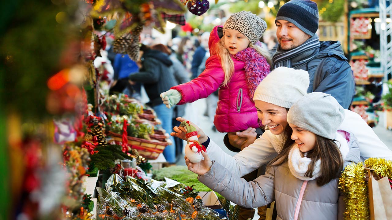 family at christmas market